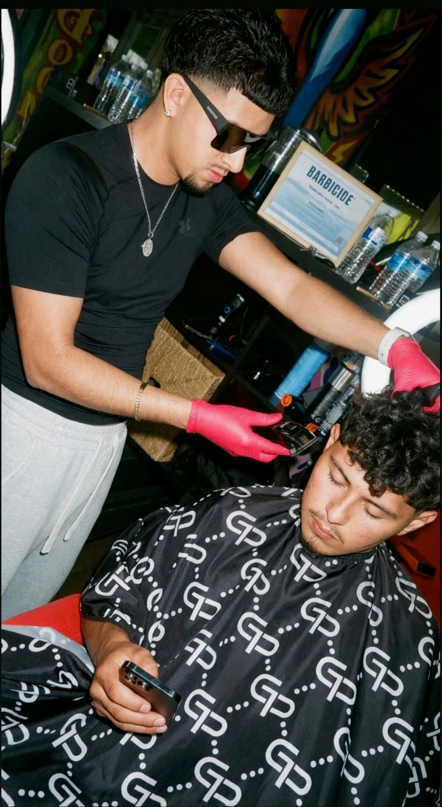 Chris, barber at Boomin' Barbershop